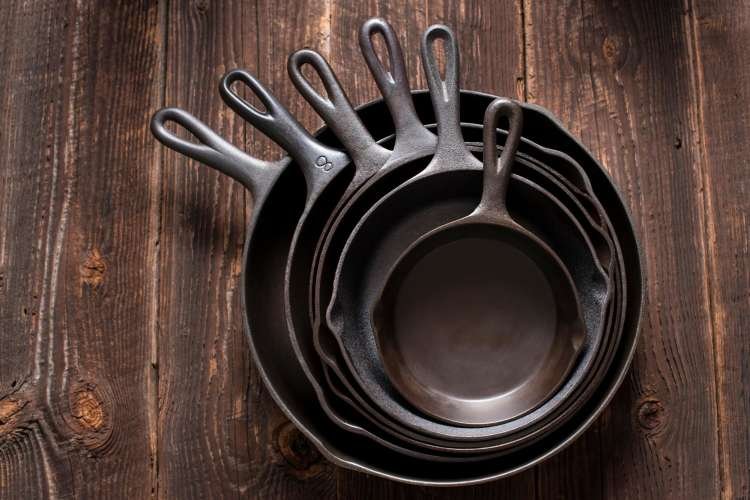 stacked cast iron pans
