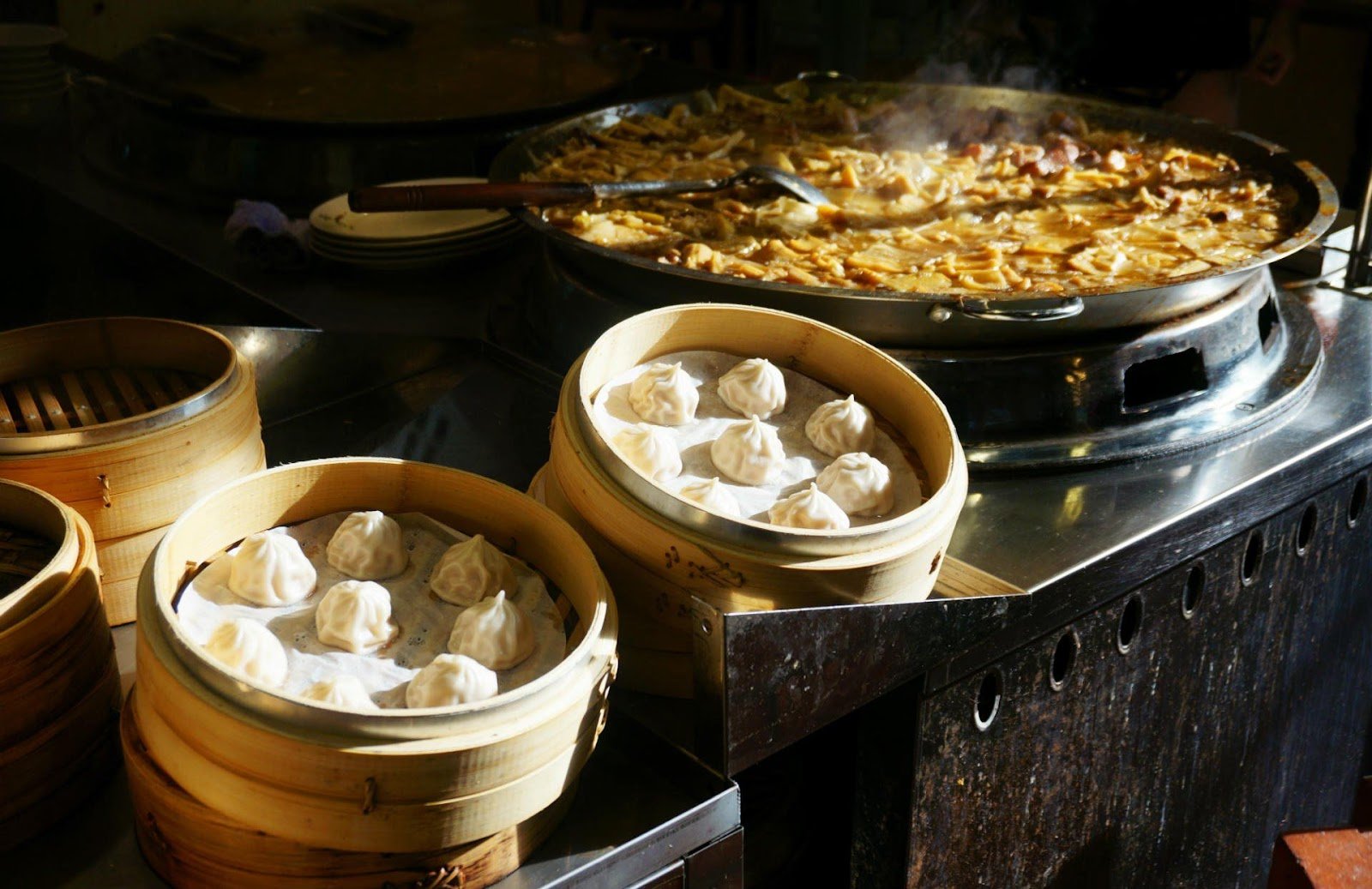 street-food-soup-dumpling-xiao-long-bao-china-shutterstock_1379602985